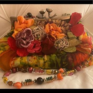 Mary Frances clutch with removable beaded strap.